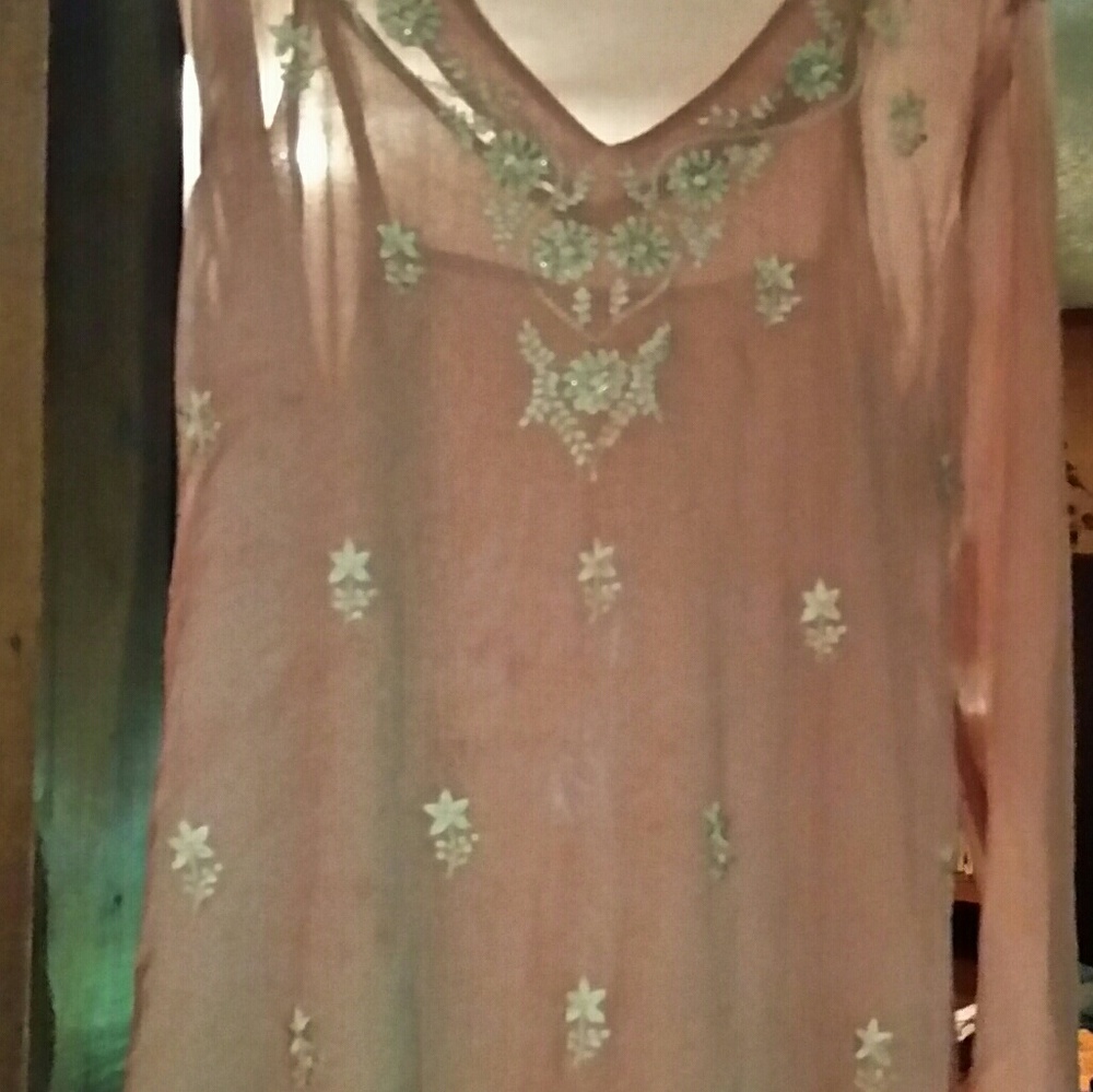 Sheer pink top with embellishments